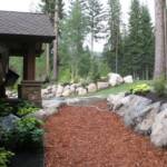 Boulders used to retain path and lawn